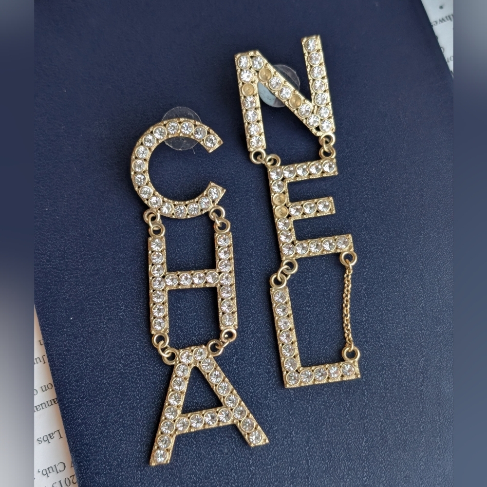 Vintage CHANEL Earrings (Missing few stones)